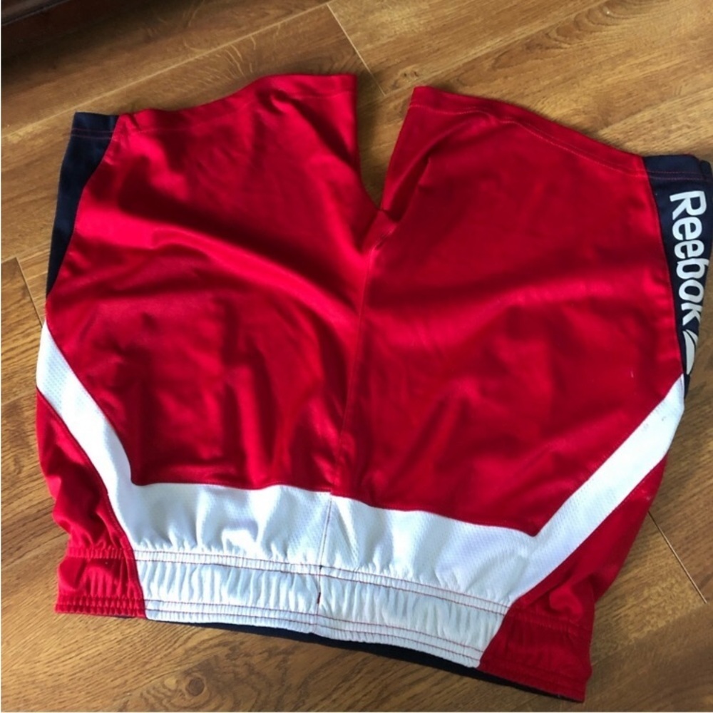 Reebok red athletic shorts in size M